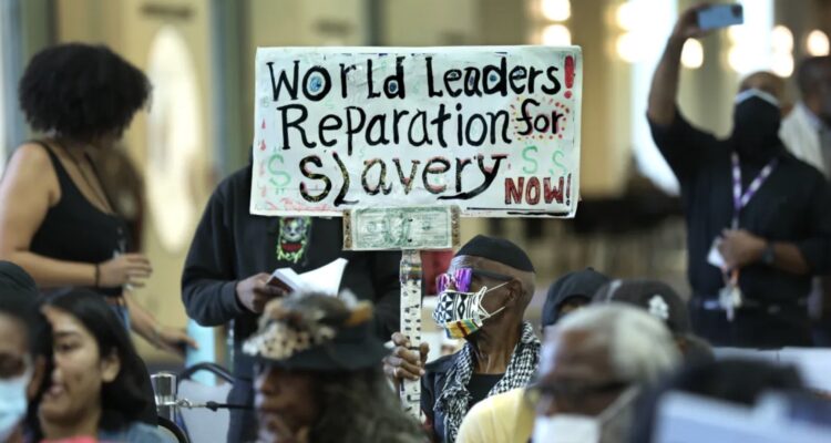 City Hall with Baltimore skyline, representing reparations fund controversy