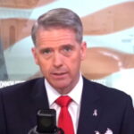 Scott Jennings speaking during a radio segment about political violence