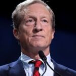 Tom Steyer speaking at a political event