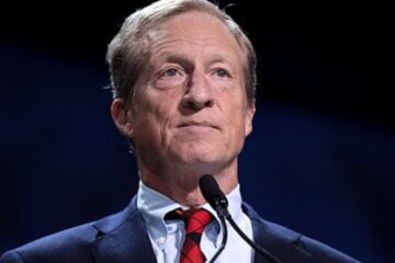 Tom Steyer speaking at a political event