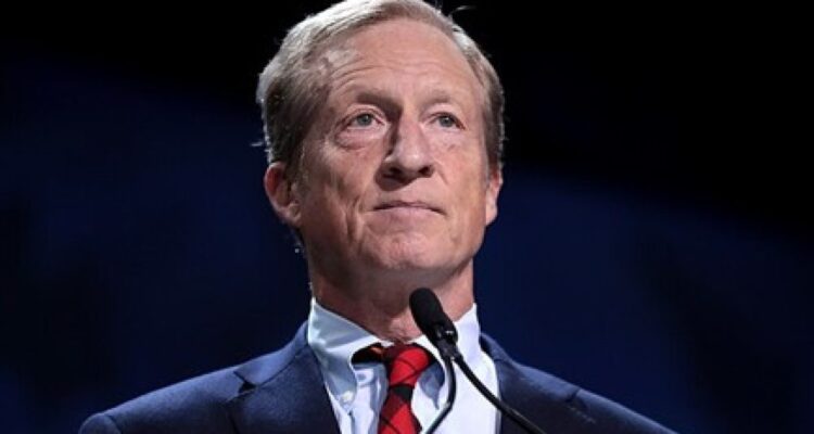 Tom Steyer speaking at a political event