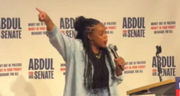 Rep. Summer Lee speaking at a campaign rally in Michigan