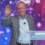 Ken Paxton speaking at a press conference in Texas