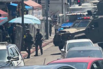 Federal agents during a major drug raid at MacArthur Park in Los Angeles