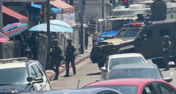 Federal agents during a major drug raid at MacArthur Park in Los Angeles