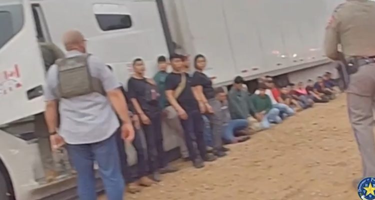 Texas DPS vehicle near a semi-truck stop in Laredo