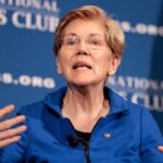 Elizabeth Warren speaking at a Senate event on tax filing policy