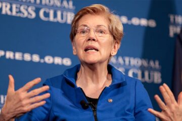 Elizabeth Warren speaking at a Senate event on tax filing policy