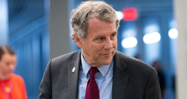 Sherrod Brown speaking at a campaign event amid border security criticism