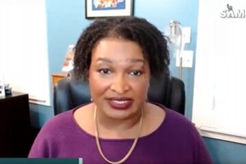 Stacey Abrams speaking while defending the SPLC