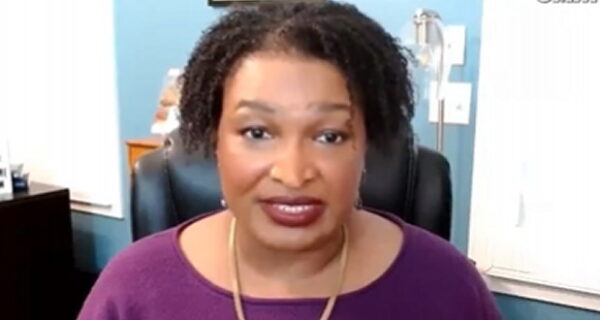 Stacey Abrams speaking while defending the SPLC