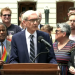 Wisconsin Gov. Tony Evers speaking at a Pride Flag Raising event