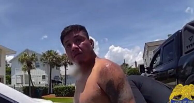 Jacksonville police officer speaking to Jose Malagon during a viral arrest video