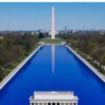 The Lincoln Memorial reflecting pool after renovation with blue sealant along the bottom