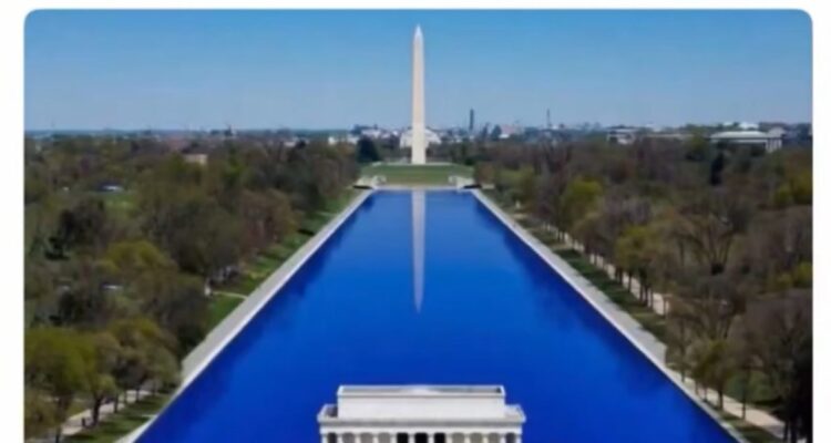 The Lincoln Memorial reflecting pool after renovation with blue sealant along the bottom