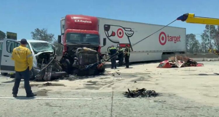 Semi-truck jackknifed on the 210 Freeway in Irwindale after a deadly crash