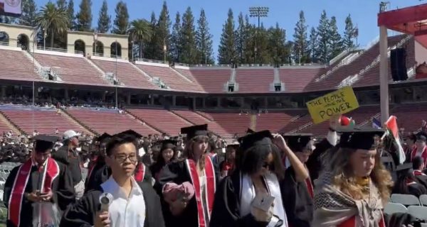 Stanford graduates walking out during Sundar Pichai’s commencement speech at Stanford Stadium