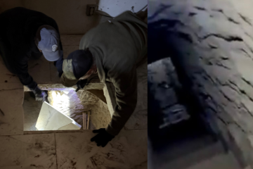 Agents inspect a drug smuggling tunnel linking Tijuana and San Diego