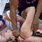 Caitlin Clark playing for the Indiana Fever during a WNBA game