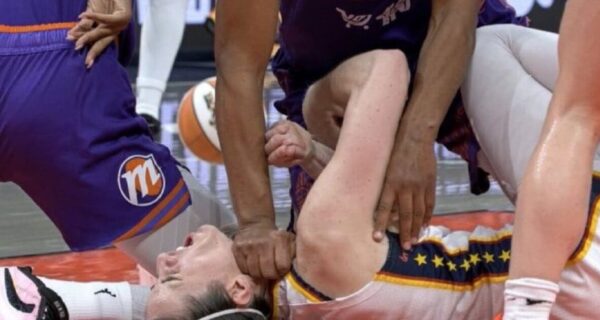 Caitlin Clark playing for the Indiana Fever during a WNBA game
