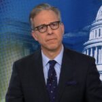 President Trump and CNN host Jake Tapper during a tense interview about Lindsey Graham and Iran