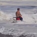 Santa Cruz lifeguard rescues boy from rough waves in California