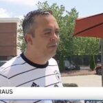 German World Cup fan Sebastian Kraus gets emotional during a television interview about kindness from an American stranger
