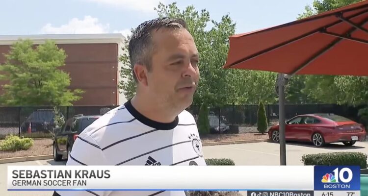 German World Cup fan Sebastian Kraus gets emotional during a television interview about kindness from an American stranger