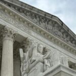 Amy Coney Barrett and John Roberts at the Supreme Court