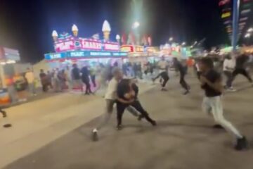 Police officers respond near the Wisconsin State Fair after multiple fights broke out on the final night
