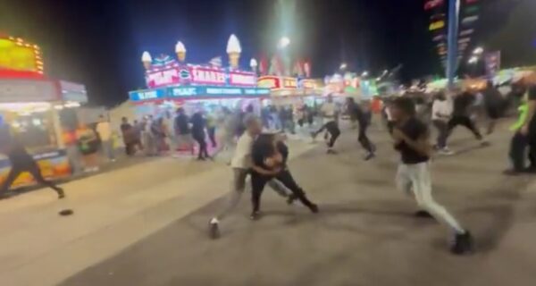 Police officers respond near the Wisconsin State Fair after multiple fights broke out on the final night