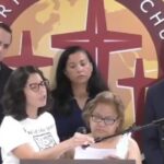 Margarita Cielo Balbuena speaks through a translator at a Democratic press conference while demanding a path to citizenship