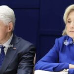 Hillary and Bill Clinton at a public event amid reports about funeral planning and health concerns