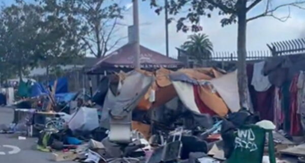 Lyanne Melendez documents tents, garbage, and debris near UC Berkeley student housing