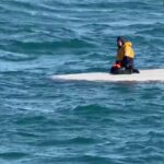 A 15-year-old Alaska boy is rescued after surviving days on an overturned fishing skiff in the Bering Sea