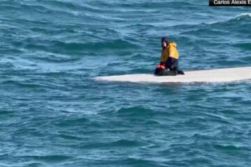 A 15-year-old Alaska boy is rescued after surviving days on an overturned fishing skiff in the Bering Sea