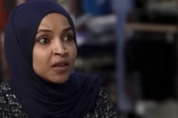 Ilhan Omar seated inside a Teamsters Union semi-truck for a Labor Day photo-op