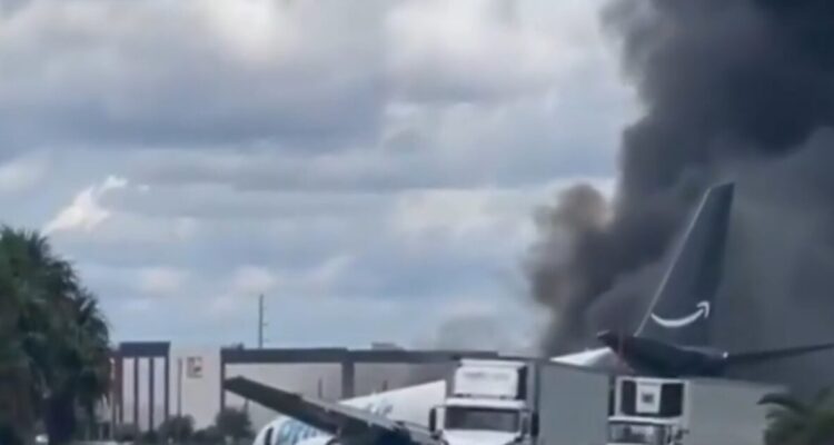 Amazon Boeing 767 cargo plane on fire after overrunning a runway at Miami International Airport