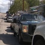 Protesters gather outside a home near Huston-Tillotson University after an East Austin parking dispute
