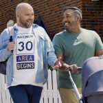 Social media image showing two men pushing a stroller, with one wearing a shirt reading “Maximum 30 Area Begins”
