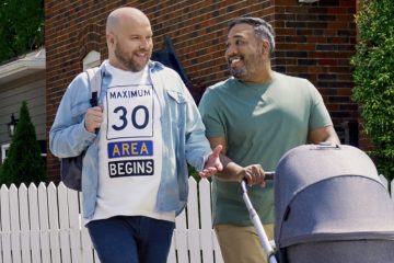Social media image showing two men pushing a stroller, with one wearing a shirt reading “Maximum 30 Area Begins”