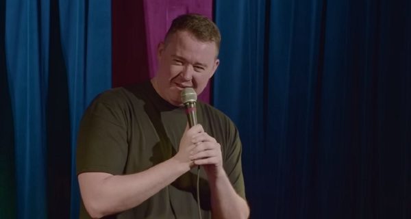 Shane Gillis hosting Saturday Night Live while celebrities react to his gym clothing joke